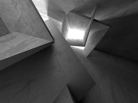 Abstract image of concrete pillars (detail of a building) in black and white.