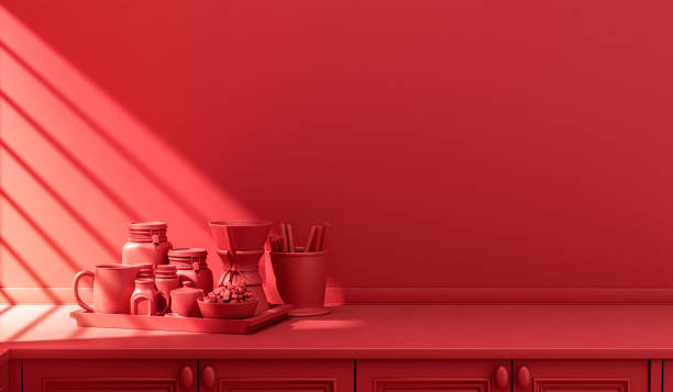 istock Stylized single color red kitchen counter and everyday utensils in morning sunlight. 1397787892