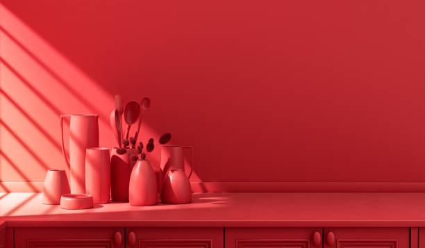 istock Stylized single color red kitchen counter and everyday utensils in morning sunlight. 1397788153