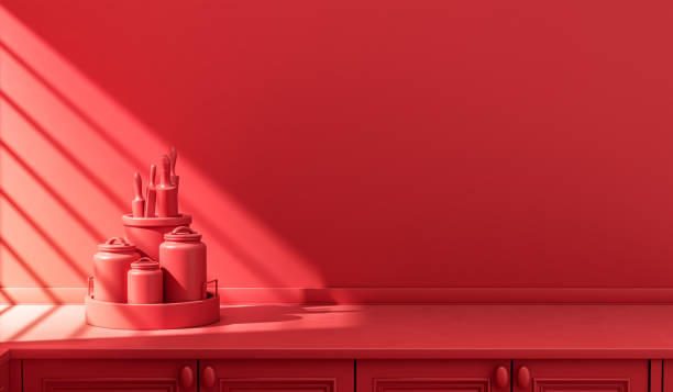 istock Stylized single color red kitchen counter and everyday utensils in morning sunlight. 1397789216
