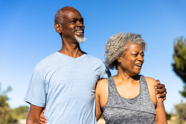 istock Senior Black Couple Relaxing Outside on a Hike 1397790393