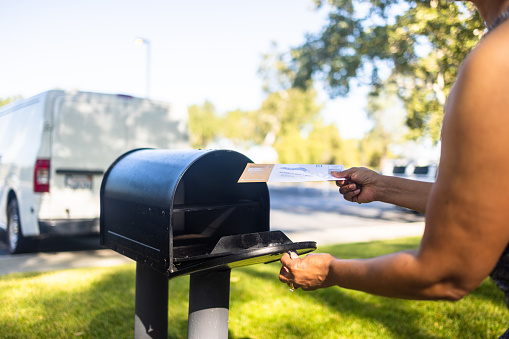 A mailbox in front of a home is a symbol of communication, connection, and community. It represents the exchange of ideas, information, and goods between individuals and groups