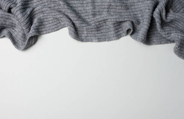 istock gray knitted fabric on a gray background, top view 1397792408