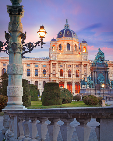 Wien, Austria - Feb 20, 2022: Kunsthistorisches Museum (Art History Museum) and statue of Maria Theresa empress at Maria-Theresien-Platz (square) by twilight