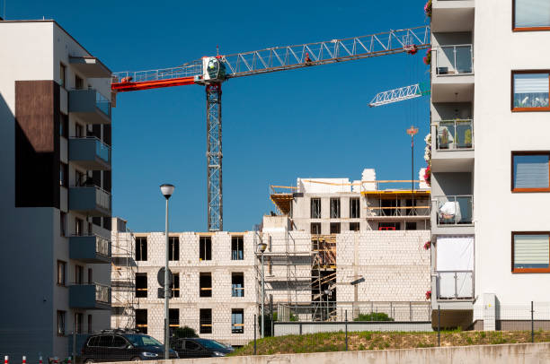 istock Modern residential buildings under construction. Construction site with tower cranes. 1397793044