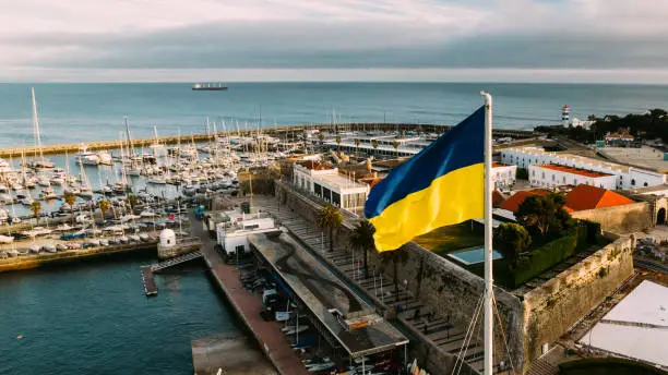 Photo of Ukrainian flag on Cascais harbour, Portugal