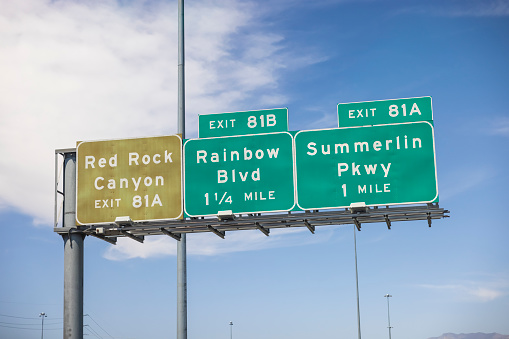 A road sign in Las Vegas, Nevada. Showing directions to Summerlin Parkway, Rainbow Blvd and Red Rock Canyon