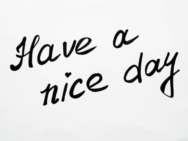 istock Have a nice day. Phrase or lettering. Black handwritten words. White background. Good day wishes or goodbye greetings. Postcard 1397808565