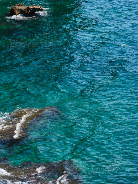 Many stones under water in clear turquoise colored cretan sea. Nature. Backgrounds. Nobody. XXXL (Sony Alpha 7R)
