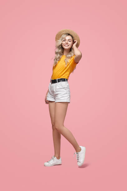 Cheerful young woman in summer outfit