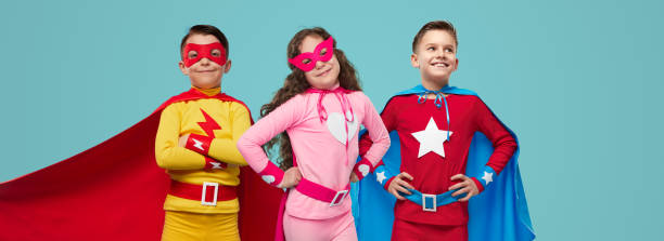 istock Team of superhero kids in studio 1397808915