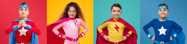 istock Confident children in superhero costumes 1397808930