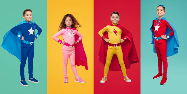 istock Courageous kids in superhero costumes in studio 1397808952