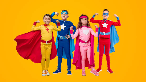 istock Strong kids in hero costumes in studio 1397808956