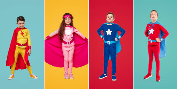 istock Confident superhero kids in colorful costumes in studio 1397808968