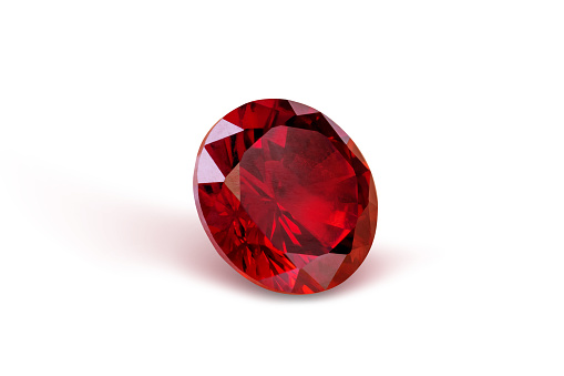 Ruby gemstone isolated on white. 