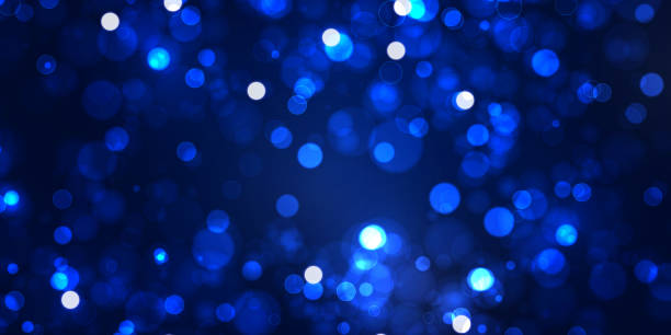 istock Sparkling magical dust particles.The dust sparks and golden stars shine with special light. 1397812299