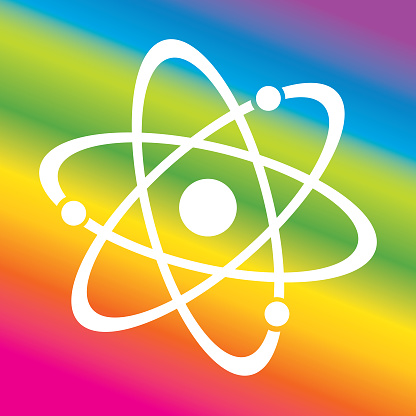 Vector illustration of a white atom on a rainbow colored background.