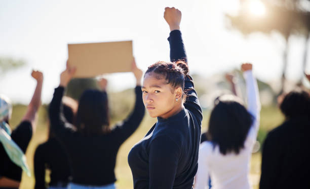 Shot of a group of people protesting climate change