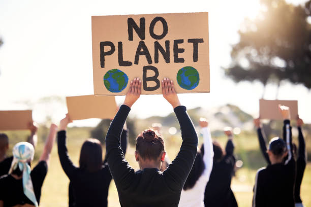 Shot of a group of people protesting climate change
