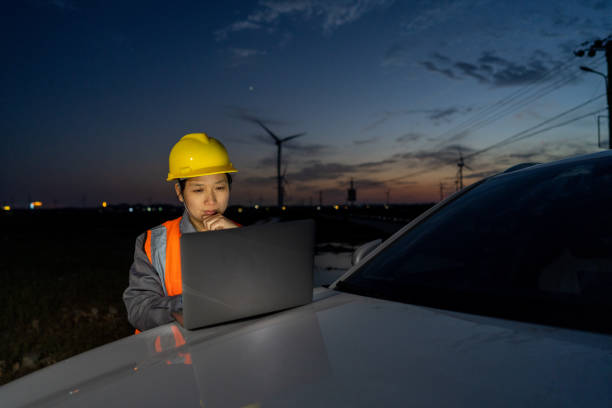 istock An Asian American wind power woman works 1397829101