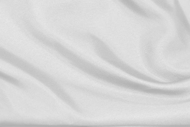 istock Smooth elegant black silk fabric or satin luxury cloth texture can use as wedding background. for drapery luxurious abstract design 1397833375