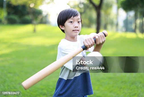 istock Young Boy Playing Baseball 1397833477