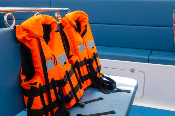 Life-jacket in speed boat. Life-jacket in speed boat. swimming protection stock pictures, royalty-free photos & images