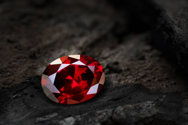 istock red ruby, gemstone jewelry on black coal background 1397833719