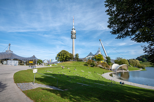 Munich, Germany - October 11, 2021:  Olympia Tower in Munich in Olympiapark under blue sky