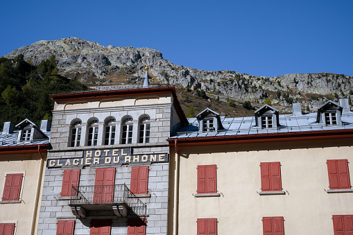 Gletsch – Switzerland – Oktober 16 2021: abandoned hotel in Gletsch at feet of Furkapass and Grimselpass in the Swiss alps
