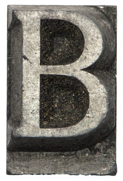 istock metal lead print letter B white background 1397842790