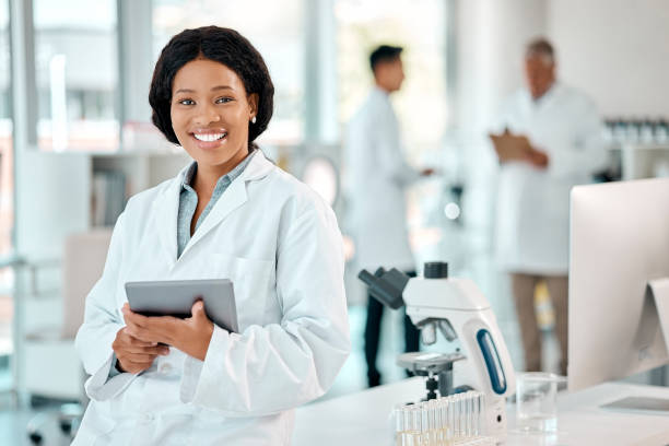 istock Portrait of a young scientist using a digital tablet in a lab 1397843841