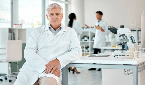 istock Portrait of a senior scientist working in a lab 1397843845