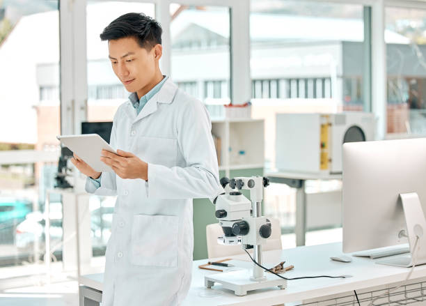 istock Shot of a young scientist using a digital tablet in a lab 1397843848