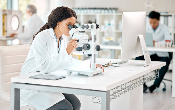 istock Shot of a young scientist using a microscope in a lab 1397843879