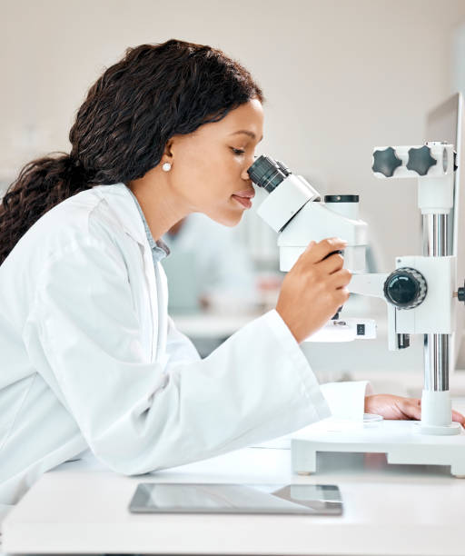 istock Shot of a young scientist using a microscope in a lab 1397843882