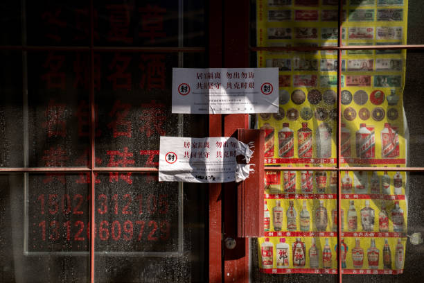 Businesses still locked behind barricades and government applied seals as the streets of Shanghai China slowly begin to open up after a nearly 2 month long COVID-19 Lockdown to curb the spread of omicron in the country to keep in line with the Chinese Government's (CCP) COVID zero policy.