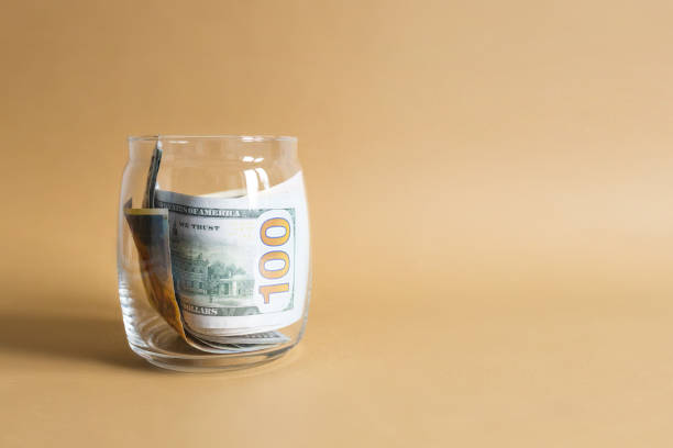 istock Bills in a glass jar 1397847238