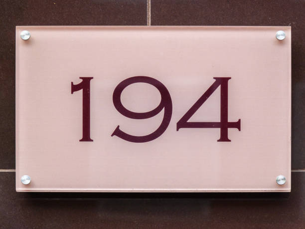istock Glass home number on a wall 1397847878