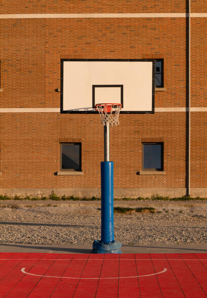 istock Basketball hoop against building with windows 1397847926