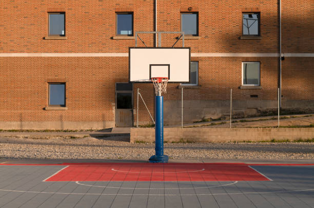 istock Basketball hoop against building with windows 1397847927