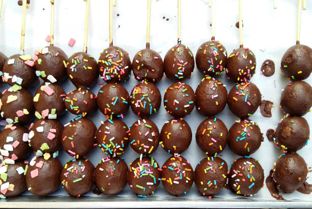 Sweet donut balls piled on a white plate