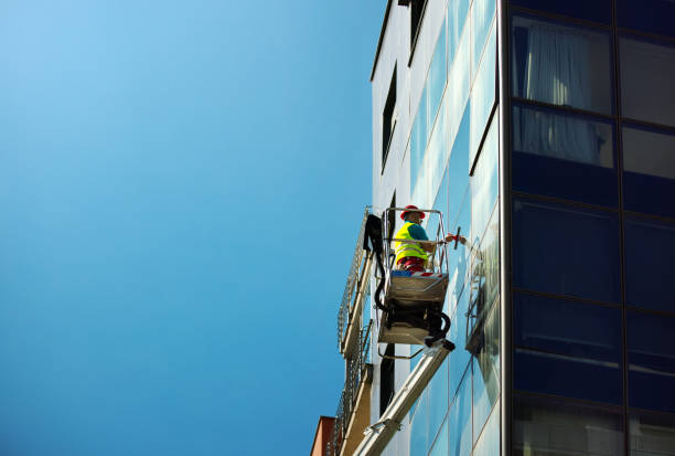 istock Cleaning windows on a residential building. 1397855536