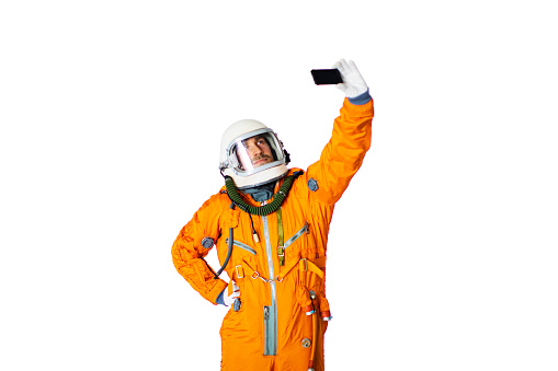 Young Man In Space Suit Making Selfie