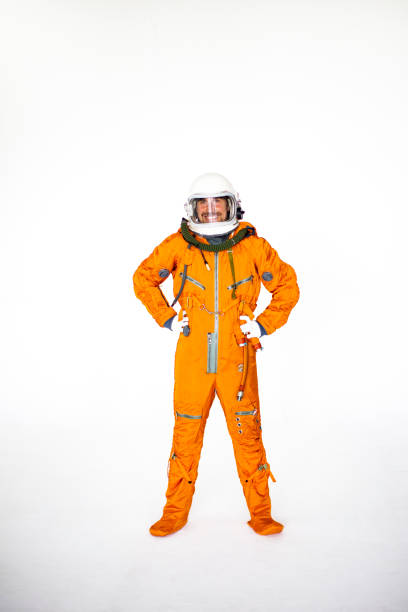istock Young Man In Space Suit Standing With Arms Akimbo 1397855957