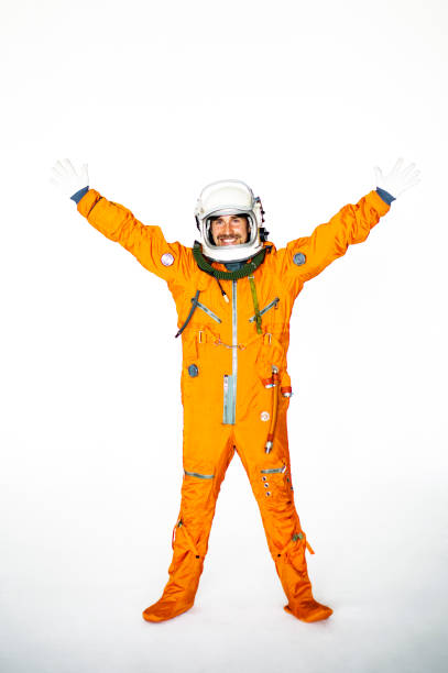 istock Young Man In Space Suit Standing With Arms Outstretched 1397855972
