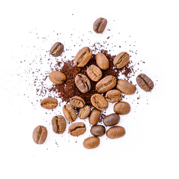 istock Roasted coffee beans with ground coffee on white background 1397859158