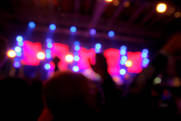 istock Blur background concert lighting on stage 1397859182