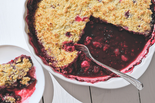 Delicious juicy dessert, blueberry pie slices topped with a sweet crunchy streusel. summer easy to do dessert.